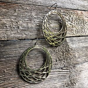 Gold hoop earrings with architectural elements